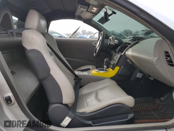 2004 Nissan 350Z Enthusiast z VIN JN1AZ36A74T013105, wystawiony jako Copart lot #82797874 z przebiegiem Nie podano mil oraz Szkoda całkowita • Salvage title. Historia ofert i sprzedaży dostępna na DreamBid. Obrazek 10.