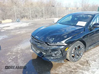 2024 Kia K5 GT-Line z VIN 5XXG64J28RG255382, wystawiony jako IAAI lot #41516382 z przebiegiem 12 330 mil mil oraz . Historia ofert i sprzedaży dostępna na DreamBid. Obrazek 6.