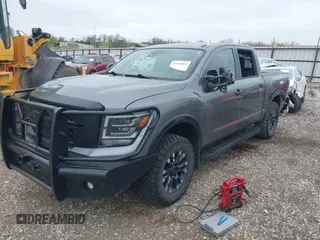 2021 Nissan Titan Pro-4X with VIN 1N6AA1ED3MN531332, listed as a IAAI auction lot 41918065 with 125,323 mi miles and . Bid and sale history available at DreamBid. Image 2.
