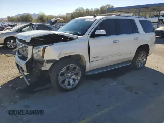 2015 GMC Yukon Denali with VIN 1GKS2CKJ7FR144809, listed as a Copart auction lot 47264525 with 79,440 mi miles and Salvage Title. Bid and sale history available at carsss.com. Image 1.