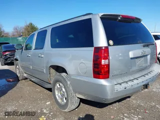 2010 Chevrolet Suburban LS with VIN 1GNUKHE31AR165699, listed as a IAAI auction lot 41509508 with 260,762 mi miles. Bid and sale history available at carsss.com. Image 3.
