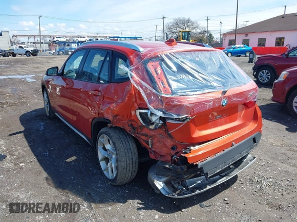 2015 BMW X1 xDrive28i with VIN WBAVL1C57FVY27822, listed as a IAAI auction lot 41977545 with 76,211 mi miles. Bid and sale history available at carsss.com. Image 17.