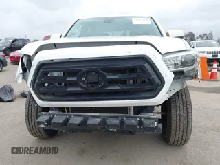 2021 Toyota Tacoma SR with VIN 3TYAX5GNXMT032184, listed as a IAAI auction lot 42204429 with 60,295 mi miles and . Bid and sale history available at DreamBid. Image 6.