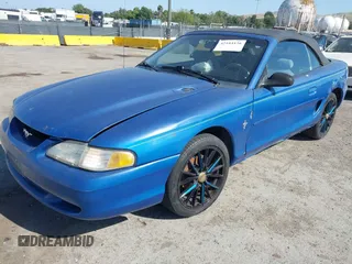 1995 Ford Mustang with VIN 1FALP444XSF180753, listed as a IAAI auction lot 42184136 with 194,084 mi miles and . Bid and sale history available at DreamBid. Image 2.
