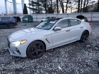 2019 Genesis G70 2.0T Advanced with VIN KMTG44LA7KU021455, listed as a Copart auction lot 87048564 with 94,429 mi miles and Salvage Title. Bid and sale history available at carsss.com. Image 1.
