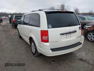 2010 Chrysler Town & Country Touring with VIN 2A4RR5D19AR441155, listed as a IAAI auction lot 41848553 with 197,088 mi miles. Bid and sale history available at carsss.com. Image 3.