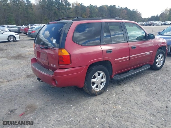 2004 GMC Envoy SLE with VIN 1GKDT13S942344209, listed as a IAAI auction lot 40727827 with 181,072 mi miles. Bid and sale history available at carsss.com. Image 4.
