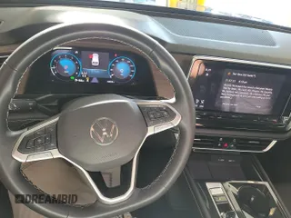 2024 Volkswagen Atlas SE with VIN 1V2HR2CA8RC579421, listed as a IAAI auction lot 42850666 with 18,926 mi miles and . Bid and sale history available at DreamBid. Image 21.