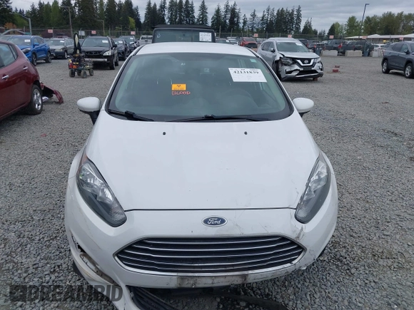 2016 Ford Fiesta S z VIN 3FADP4TJ8GM193620, wystawiony jako IAAI lot #42131839 z przebiegiem 155 664 mil mil oraz . Historia ofert i sprzedaży dostępna na DreamBid. Obrazek 13.