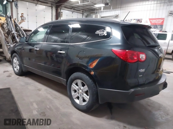 2012 Chevrolet Traverse 1LT z VIN 1GNKVGED8CJ213010, wystawiony jako IAAI lot #41491520 z przebiegiem 185 111 mil mil oraz . Historia ofert i sprzedaży dostępna na DreamBid. Obrazek 3.