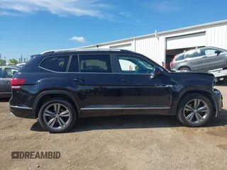 2019 Volkswagen Atlas SEL R-Line z VIN 1V2RR2CA0KC579035, wystawiony jako IAAI lot #42205407 z przebiegiem 66 188 mil mil oraz . Historia ofert i sprzedaży dostępna na DreamBid. Obrazek 13.