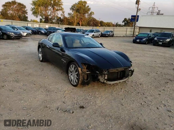 2009 Maserati GranTurismo с VIN ZAMGJ45A190042805, выставлен на аукционе Copart как лот 70785674 с пробегом 71 810 миль миль и Списание • Salvage title. История ставок и продаж доступна на DreamBid. Изображение 10.