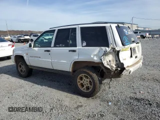 1996 Jeep Grand Cherokee Limited with VIN 1J4GZ78S2TY123592, listed as a Copart auction lot 84387624 with Not Provided miles and Salvage Title. Bid and sale history available at carsss.com. Image 2.