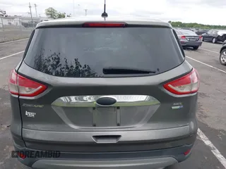 2013 Ford Escape SEL z VIN 1FMCU9H96DUC66206, wystawiony jako IAAI lot #42376442 z przebiegiem 96 776 mil mil oraz . Historia ofert i sprzedaży dostępna na DreamBid. Obrazek 16.