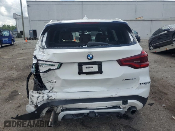 2020 BMW X3 xDrive30i with VIN 5UXTY5C08LLT32459, listed as a Copart auction lot 54904225 with 27,918 mi miles and Salvage Title. Bid and sale history available at DreamBid. Image 6.