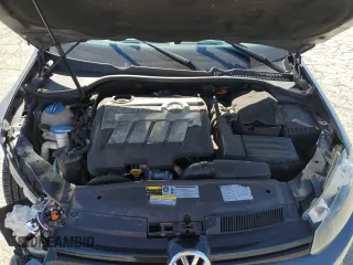 2014 Volkswagen Golf TDI w/Sunroof & Nav z VIN WVWNM7AJ2EW006137, wystawiony jako Copart lot #57031715 z przebiegiem 136 654 mil mil oraz Szkoda całkowita • Salvage title. Historia ofert i sprzedaży dostępna na DreamBid. Obrazek 11.