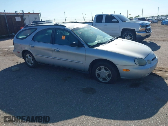 1996 Ford Taurus GL z VIN 1FALP57U9TG184497, wystawiony jako IAAI lot #42290105 z przebiegiem 149 155 mil mil oraz . Historia ofert i sprzedaży dostępna na DreamBid. Obrazek 1.