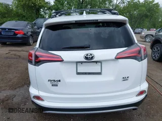 2016 Toyota RAV4 XLE with VIN 2T3RFREV8GW450273, listed as a IAAI auction lot 42281091 with 75,478 mi miles and . Bid and sale history available at DreamBid. Image 16.