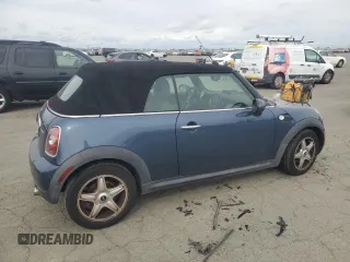 2010 MINI Convertible with VIN WMWMR3C52ATU98506, listed as a Copart auction lot 47706195 with 92,804 mi miles and Clean Title. Bid and sale history available at DreamBid. Image 3.