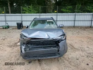 2022 Toyota Corolla Cross LE z VIN 7MUCAAAG8NV017408, wystawiony jako Copart lot #59096555 z przebiegiem 33 703 mil mil oraz Szkoda całkowita • Salvage title. Historia ofert i sprzedaży dostępna na DreamBid. Obrazek 14.