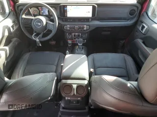 2024 Jeep Wrangler Rubicon with VIN 1C4PJXFG9RW346079, listed as a Copart auction lot 77006914 with 2,446 mi miles and Salvage Title. Bid and sale history available at DreamBid. Image 8.