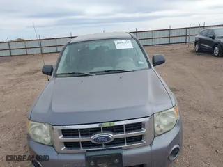 2008 Ford Escape XLS with VIN 1FMCU02Z58KA18082, listed as a IAAI auction lot 41957377 with 141,200 mi miles. Bid and sale history available at carsss.com. Image 6.