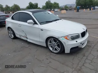 2013 BMW 1 Series 135i with VIN WBAUC9C54DVY60154, listed as a IAAI auction lot 42354743 with 159,571 mi miles and . Bid and sale history available at DreamBid. Image 1.