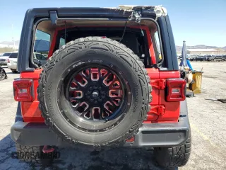 2019 Jeep Wrangler Unlimited Rubicon with VIN 1C4HJXFN7KW519171, listed as a Copart auction lot 56251325 with 69,094 mi miles and Salvage title. Bid and sale history available at DreamBid. Image 6.