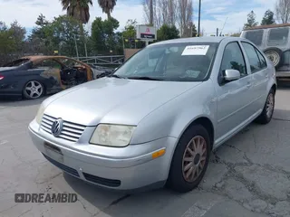 2003 Volkswagen Jetta GL with VIN 3VWRK69M43M045127, listed as a IAAI auction lot 41697962 with 119,065 mi miles and . Bid and sale history available at DreamBid. Image 2.