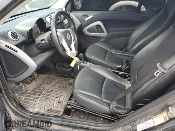 2012 Smart fortwo Pure with VIN WMEEJ3BA2CK519118, listed as a Copart auction lot 57813115 with 127,472 mi miles and Clean title. Bid and sale history available at DreamBid. Image 7.