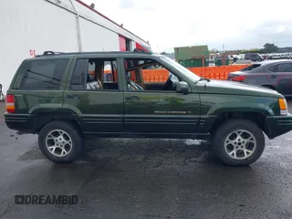 1996 Jeep Grand Cherokee Limited with VIN 1J4GZ78S0TC235692, listed as a IAAI auction lot 41945617 with Not provided miles and . Bid and sale history available at DreamBid. Image 13.