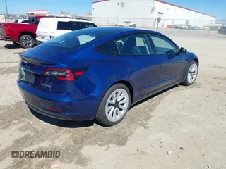2021 Tesla Model 3 Long Range with VIN 5YJ3E1EB3MF031457, listed as a IAAI auction lot 41630758 with 71,113 mi miles and . Bid and sale history available at carsss.com. Image 4.