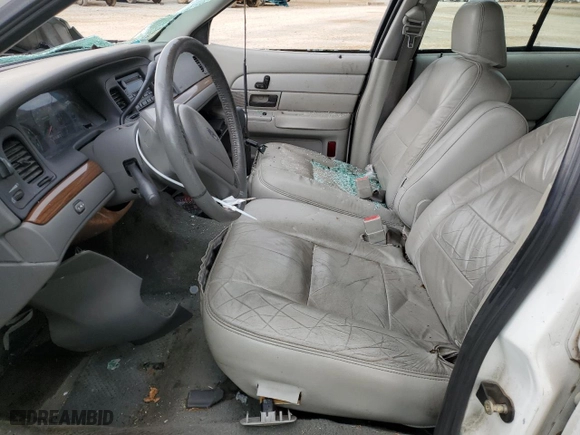 2003 Ford Crown Victoria LX with VIN 2FAFP74W03X158931, listed as a Copart auction lot 71588824 with 165,074 mi miles and Salvage Title. Bid and sale history available at carsss.com. Image 7.