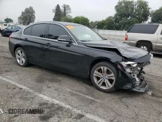 2017 BMW 3 Series 330i with VIN WBA8B9G52HNU48528, listed as a Copart auction lot 59442995 with 109,852 mi miles and Salvage title. Bid and sale history available at DreamBid. Image 4.