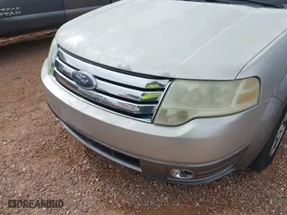 2008 Ford Taurus X SEL with VIN 1FMDK05W08GA34981, listed as a IAAI auction lot 41375371 with 233,889 mi miles. Bid and sale history available at carsss.com. Image 6.