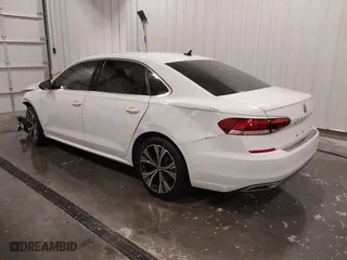 2021 Volkswagen Passat 2.0T SE with VIN 1VWSA7A37MC017676, listed as a IAAI auction lot 41647899 with 40,404 mi miles. Bid and sale history available at carsss.com. Image 3.