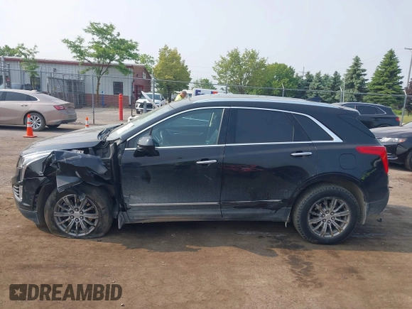 2018 Cadillac XT5 Luxury AWD with VIN 1GYKNDRSXJZ247863, listed as a IAAI auction lot 42392404 with 96,629 mi miles and . Bid and sale history available at DreamBid. Image 14.