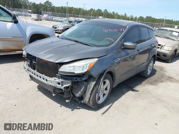 2013 Ford Escape SE with VIN 1FMCU0G93DUA21926, listed as a IAAI auction lot 41901699 with 174,456 mi miles and . Bid and sale history available at DreamBid. Image 2.