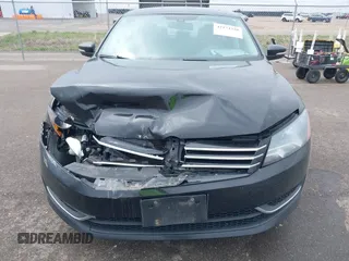 2013 Volkswagen Passat SE with VIN 1VWBP7A31DC017929, listed as a IAAI auction lot 42174320 with 169,596 mi miles and . Bid and sale history available at DreamBid. Image 12.