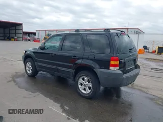 2005 Ford Escape XLT with VIN 1FMCU03135KB37656, listed as a IAAI auction lot 41908207 with 191,899 mi miles. Bid and sale history available at carsss.com. Image 3.
