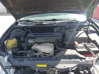 2002 Toyota Camry LE z VIN JTDBE32KX20111362, wystawiony jako IAAI lot #41820475 z przebiegiem 270 091 mil mil oraz . Historia ofert i sprzedaży dostępna na DreamBid. Obrazek 10.