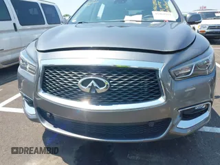 2019 Infiniti QX60 Pure with VIN 5N1DL0MN7KC563655, listed as a IAAI auction lot 42469111 with 84,864 mi miles and . Bid and sale history available at DreamBid. Image 6.