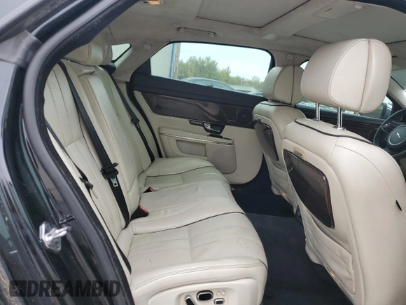 2013 Jaguar XJ with VIN SAJWA2GB7DLV40560, listed as a Copart auction lot 78228114 with 110,750 mi miles and Salvage Title. Bid and sale history available at carsss.com. Image 10.