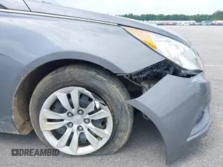 2013 Hyundai Sonata GLS z VIN 5NPEB4ACXDH569785, wystawiony jako IAAI lot #39392769 z przebiegiem 69 934 mil mil oraz . Historia ofert i sprzedaży dostępna na DreamBid. Obrazek 6.