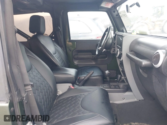 2008 Jeep Wrangler Sahara with VIN 1J4FA54118L653044, listed as a IAAI auction lot 42557244 with 152,072 mi miles and . Bid and sale history available at DreamBid. Image 5.