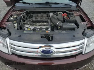 2009 Ford Taurus SE with VIN 1FAHP23W89G125025, listed as a Copart auction lot 80710004 with 114,176 mi miles and Salvage Title. Bid and sale history available at carsss.com. Image 11.