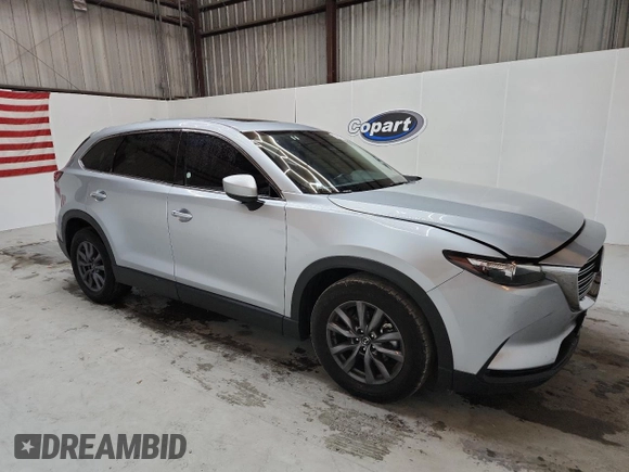 2023 Mazda CX-9 Touring with VIN JM3TCBCY9P0656636, listed as a Copart auction lot 64243905 with 59,788 mi miles and Non repairable. Bid and sale history available at DreamBid. Image 4.
