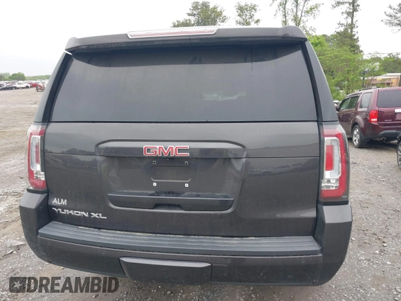 2015 GMC Yukon XL SLE z VIN 1GKS1GKC8FR507436, wystawiony jako IAAI lot #42113696 z przebiegiem Nie podano mil oraz . Historia ofert i sprzedaży dostępna na DreamBid. Obrazek 16.