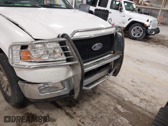 2005 Ford F-150 XLT with VIN 1FTPX14565FB60720, listed as a IAAI auction lot 41728673 with 148,187 mi miles. Bid and sale history available at carsss.com. Image 6.