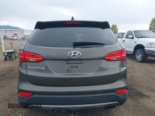 2014 Hyundai Santa Fe z VIN 5XYZTDLB1EG144290, wystawiony jako IAAI lot #42126367 z przebiegiem 138 525 mil mil oraz . Historia ofert i sprzedaży dostępna na DreamBid. Obrazek 16.